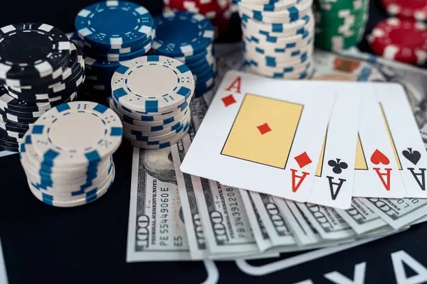 Live Baccarat dealer at link koitoto studio dealing cards to Banker and Player positions